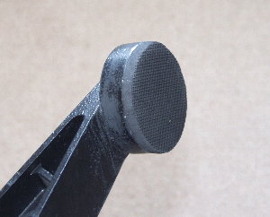 Rubber pad sanded to final shape once the glue has set